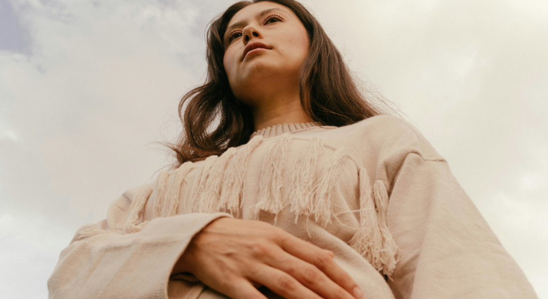 woman holding her pregnant belly